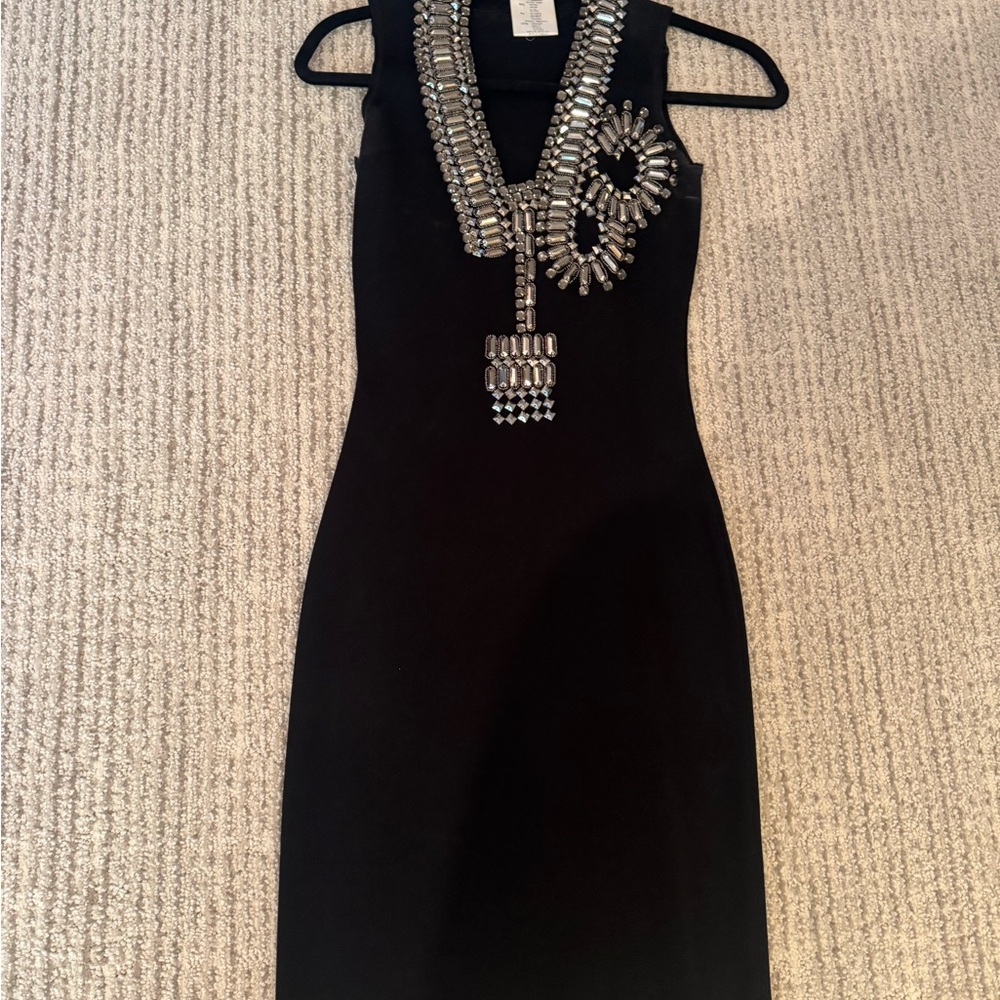 Elegant Black Sleeveless Dress with Embellishments (excellent condition)